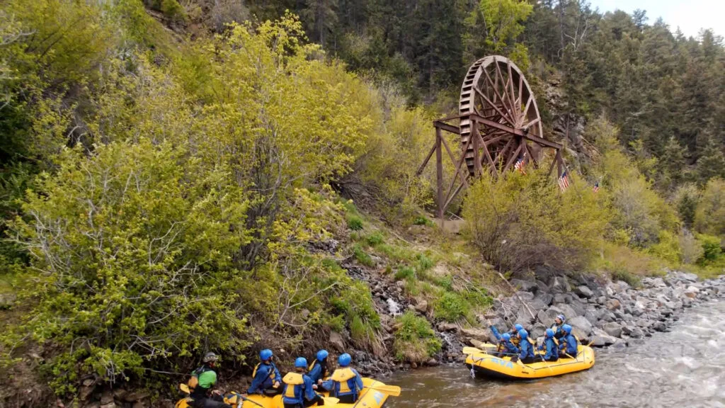 clear creek rafting past the Idaho Springs waterwheel